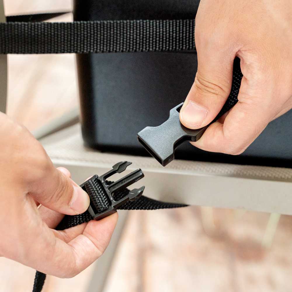 Table Tek Black Plastic Booster Seat - Dual Height, with Strap - 12 1/2" x 8 3/4" - 1 count box