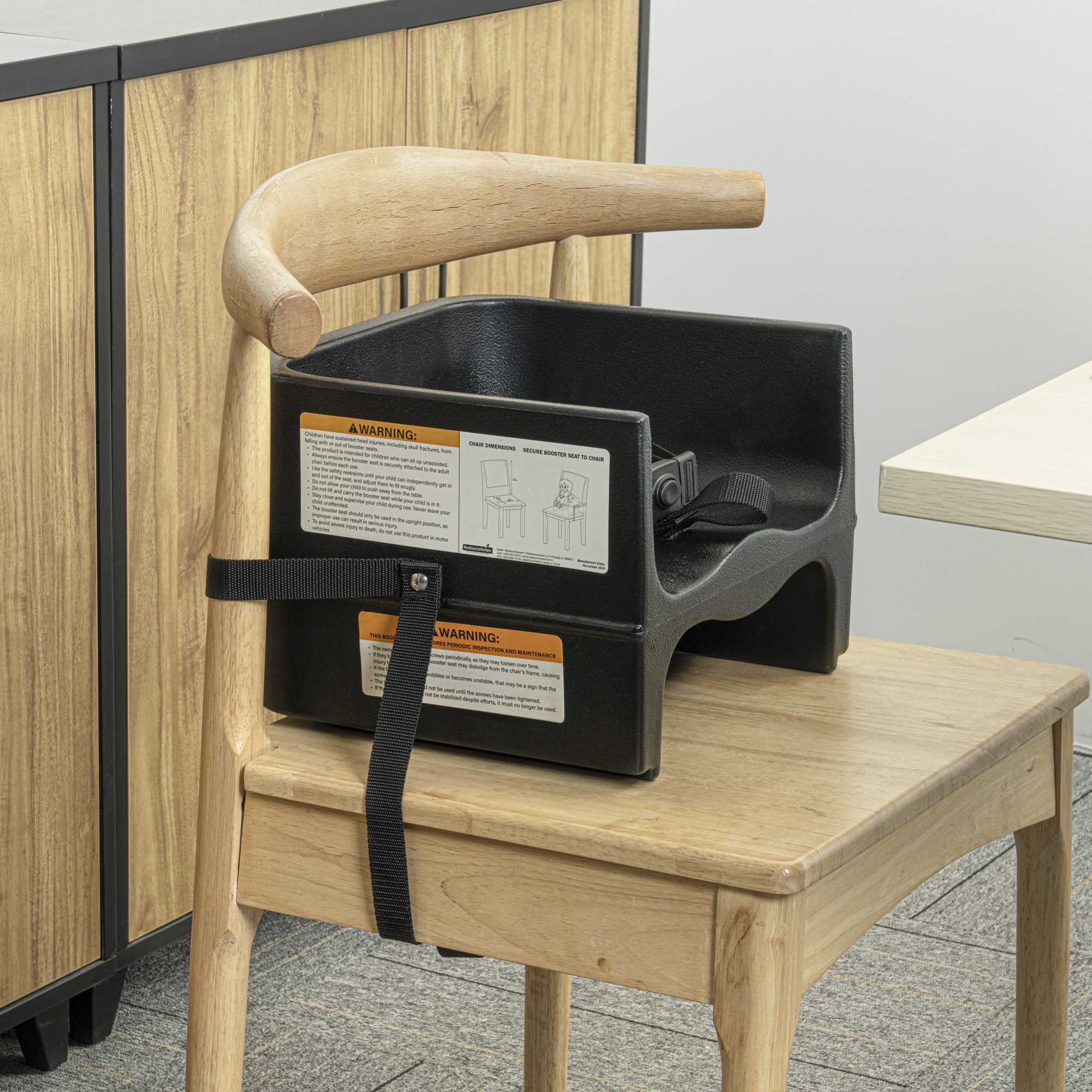 Table Tek Black Plastic Booster Seat - Dual Height, with Strap - 12 1/2" x 8 3/4" - 1 count box